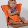 Le Harnais chaise bébé Transforme toute Chaise - Pliable et Lavable - Orange